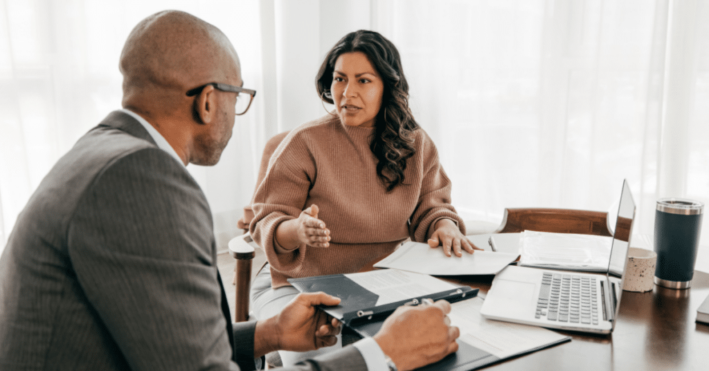 two people at a meeting