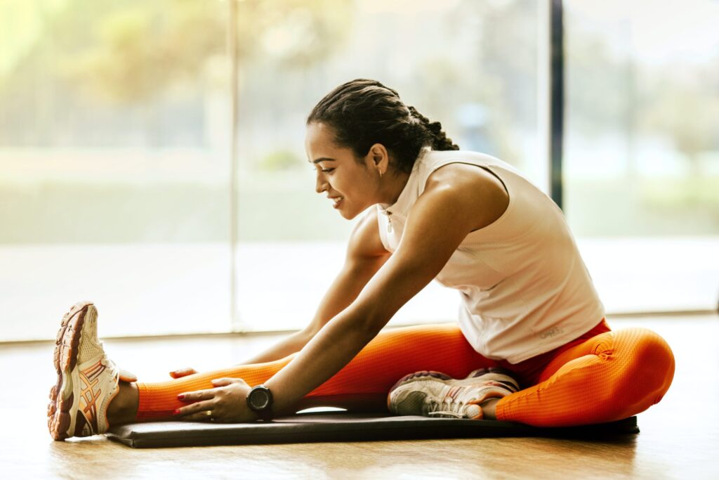 Person stretching on yoga mat